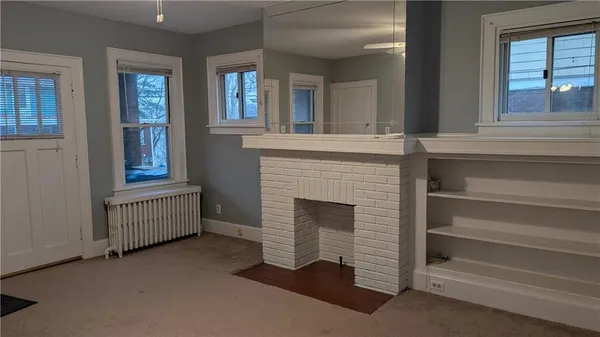 a kitchen with a sink and a refrigerator