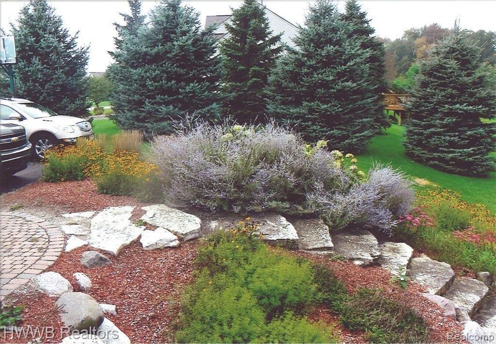 10321 Durham Road Clarkston, MI 48348 - Photo 2 of 23 Extensive stonework