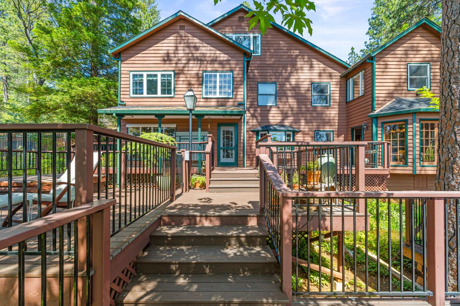 5821 Spanish Flat Road Placerville, CA 95667 - Photo 2 of 97 a front view of a house with balcony
