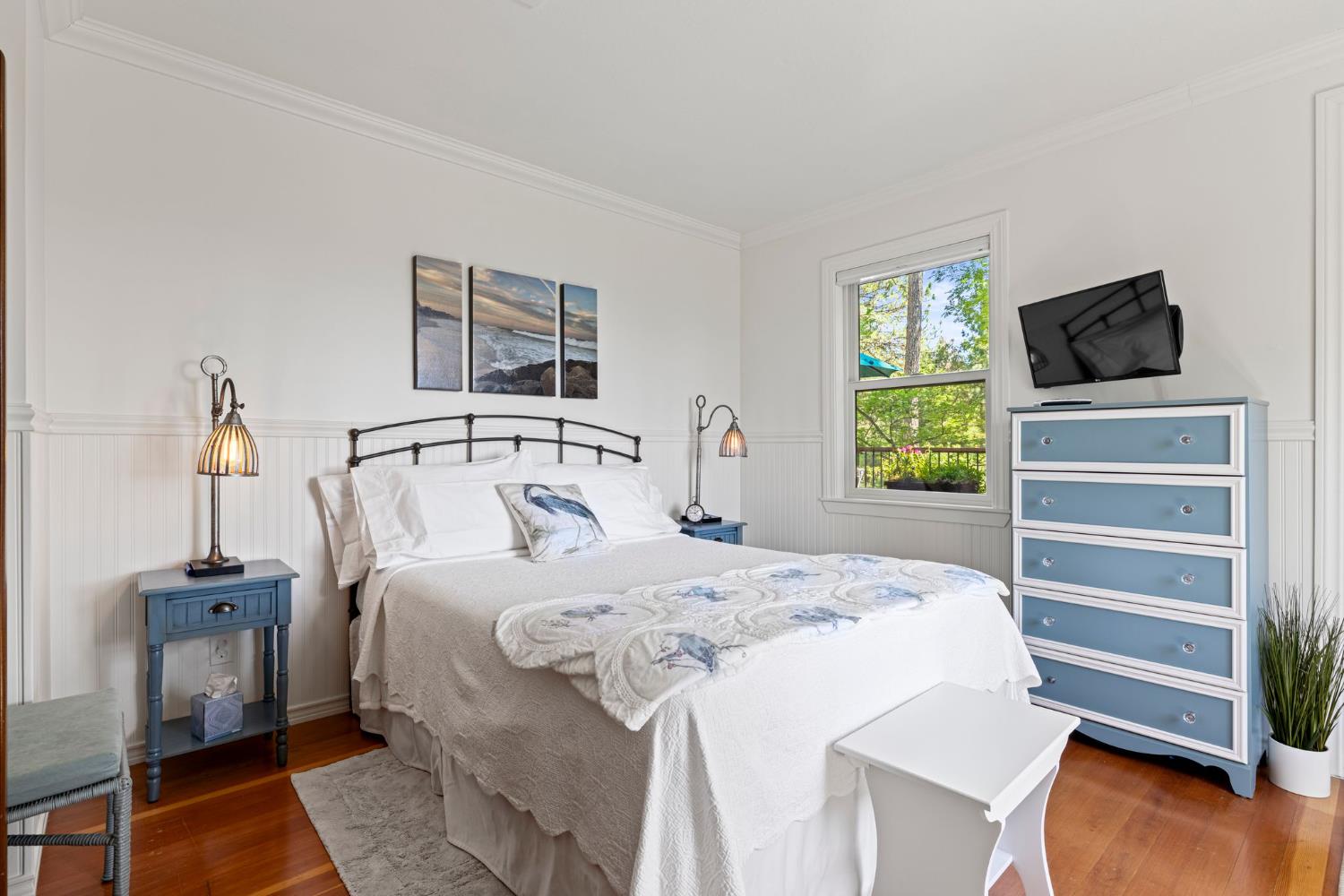 5821 Spanish Flat Road Placerville, CA 95667 - Photo 33 of 97 a bedroom with a bed and a flat screen tv