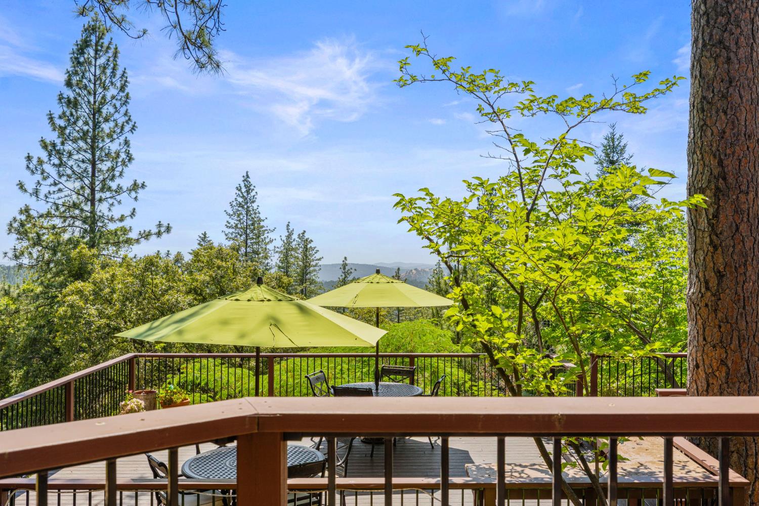 5821 Spanish Flat Road Placerville, CA 95667 - Photo 45 of 97 a view of a balcony with two chairs and a table
