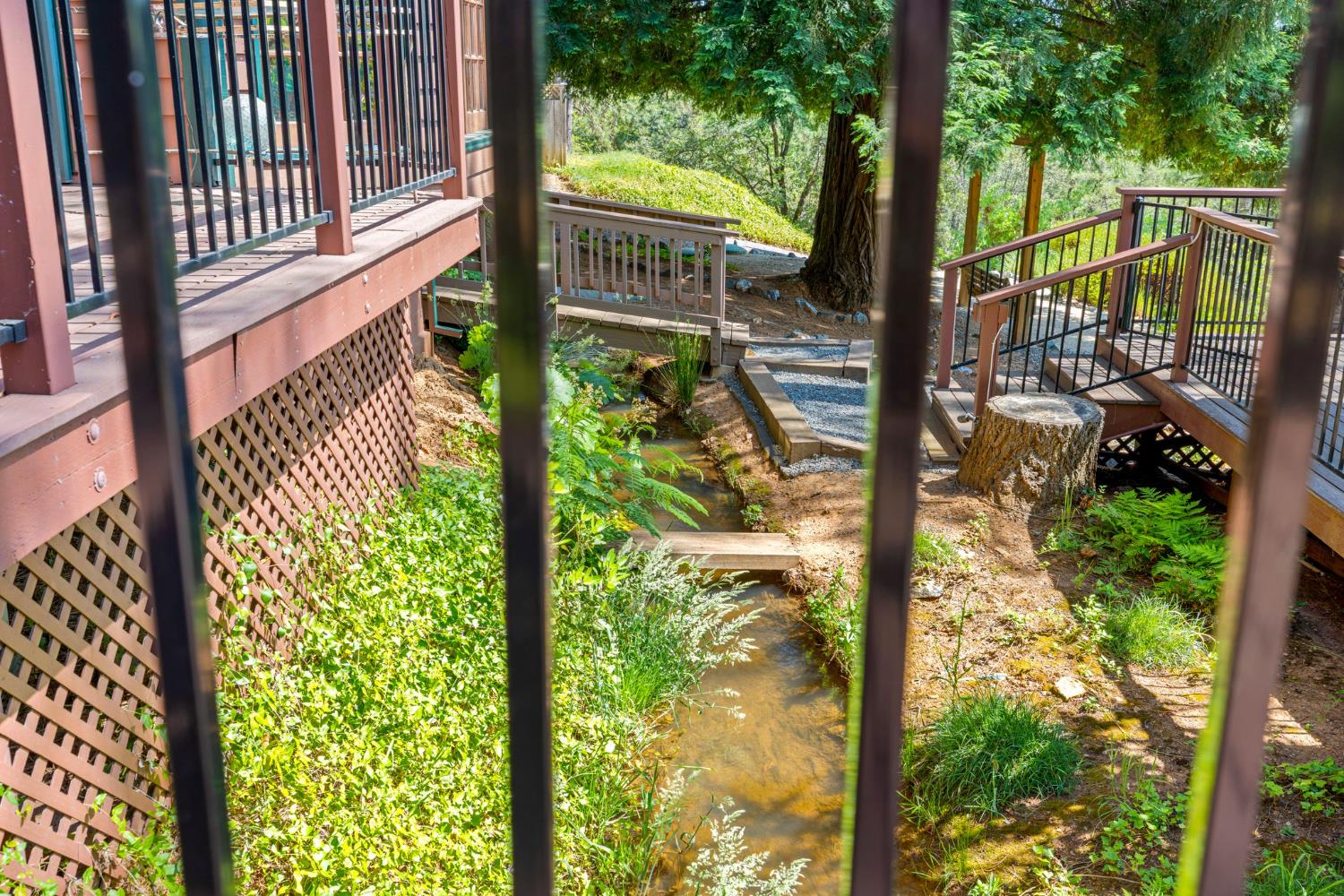 5821 Spanish Flat Road Placerville, CA 95667 - Photo 47 of 97 a view of a porch with a floor to ceiling window wooden floor