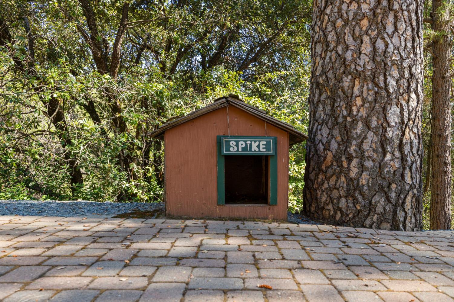 5821 Spanish Flat Road Placerville, CA 95667 - Photo 60 of 97 a sign that is sitting in front of a house