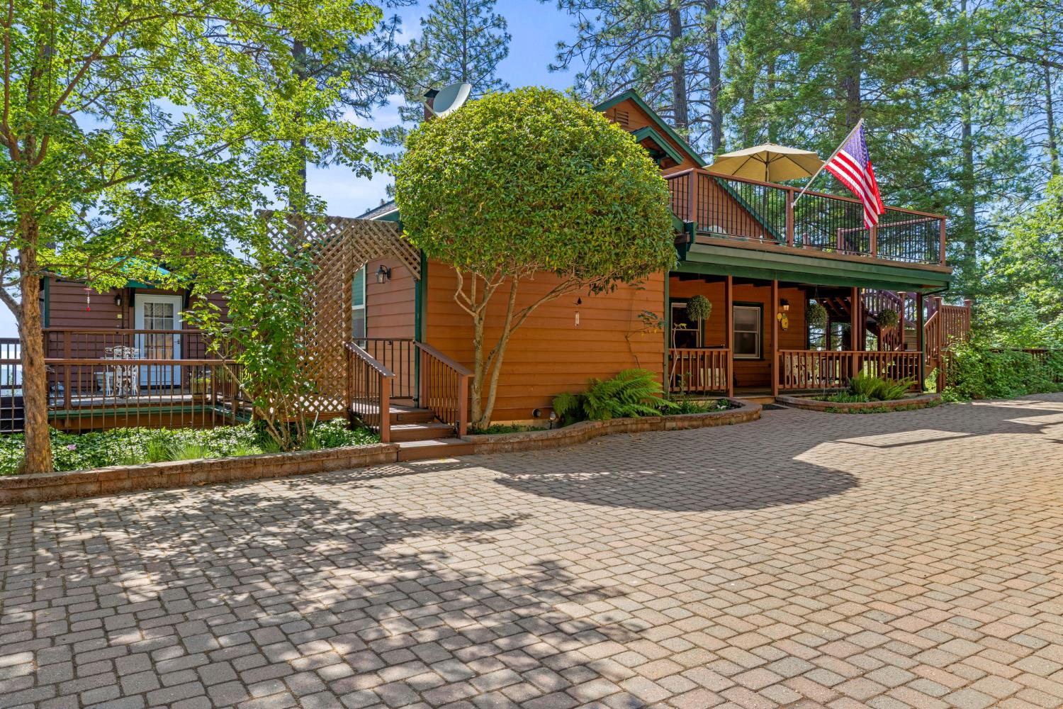 5821 Spanish Flat Road Placerville, CA 95667 - Photo 61 of 97 a front view of a house with garden