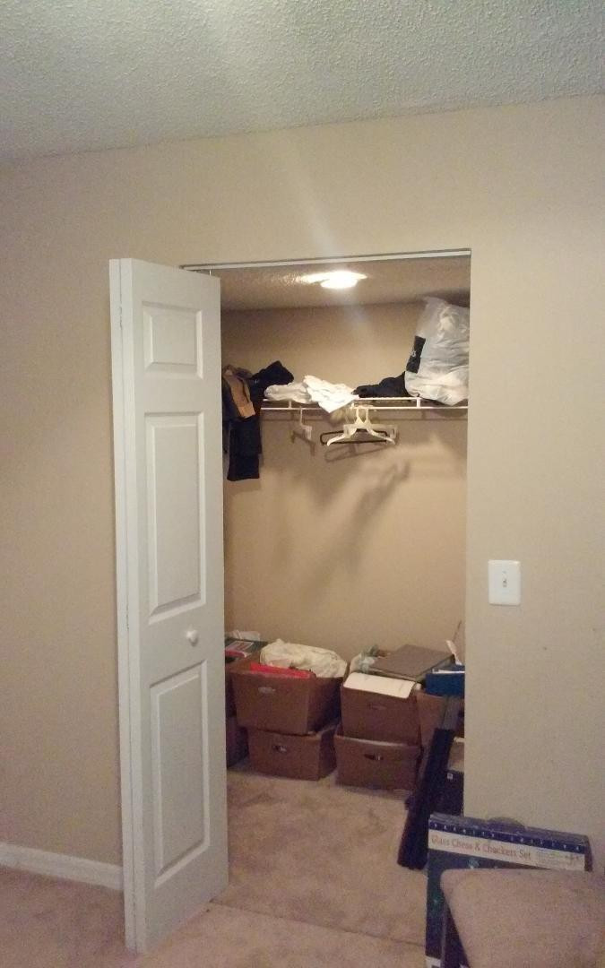 4171 Haverhill Road, Unit 1013 West Palm Beach, FL 33417 - Photo 13 of 14 a room with a couch