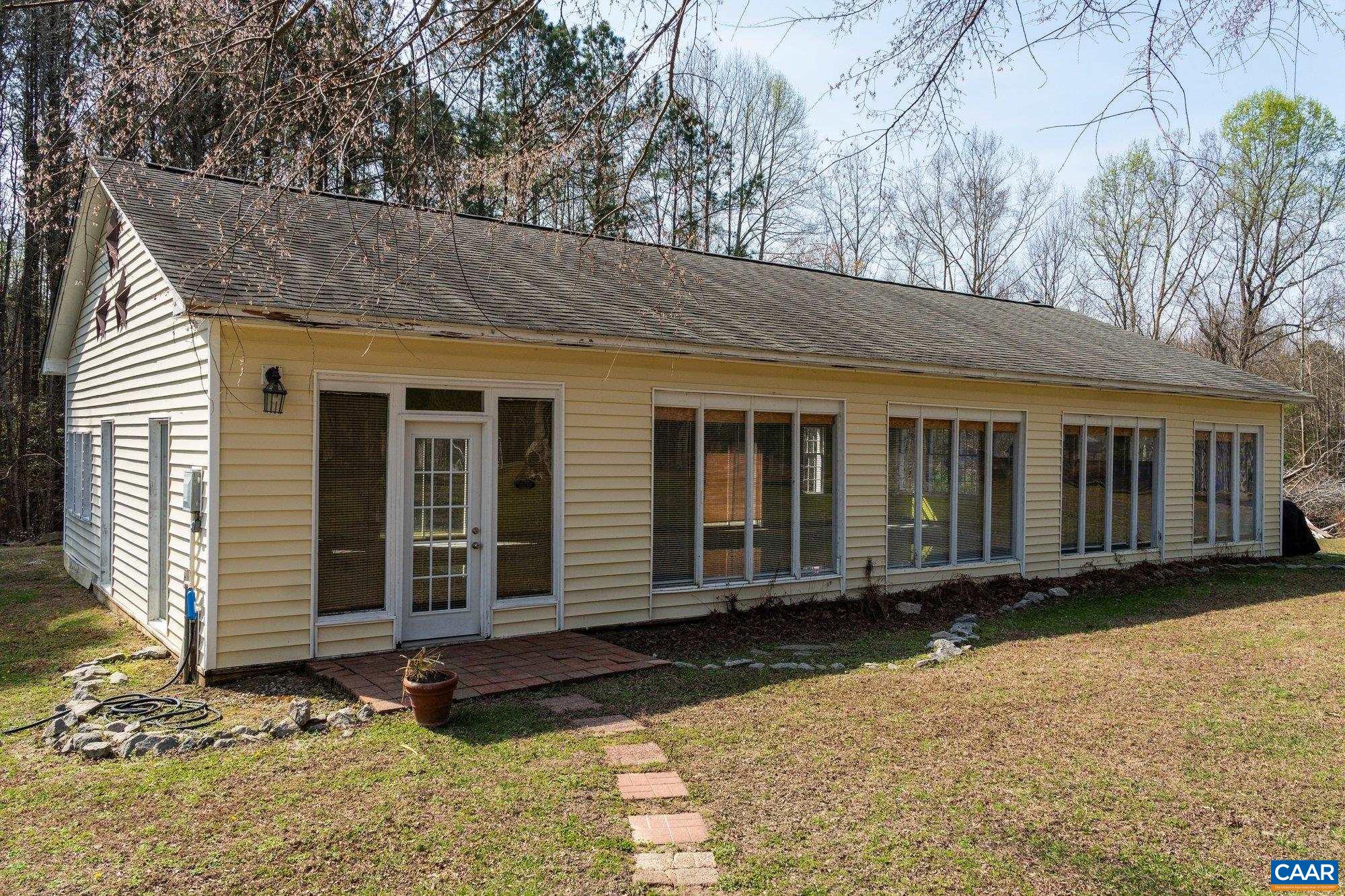 14910 Western Mill Road Lawrenceville, VA 23868 - Photo 68 of 73 a view of a house with a yard