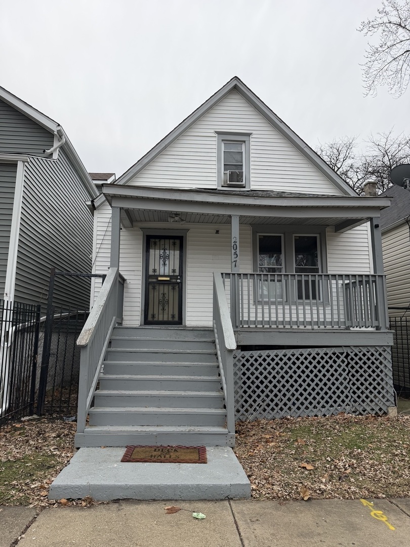 a view of a house with a white door