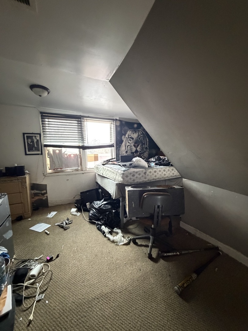 2057 West 70th Place Chicago, IL 60636 - Photo 6 of 8 a room with gym equipment