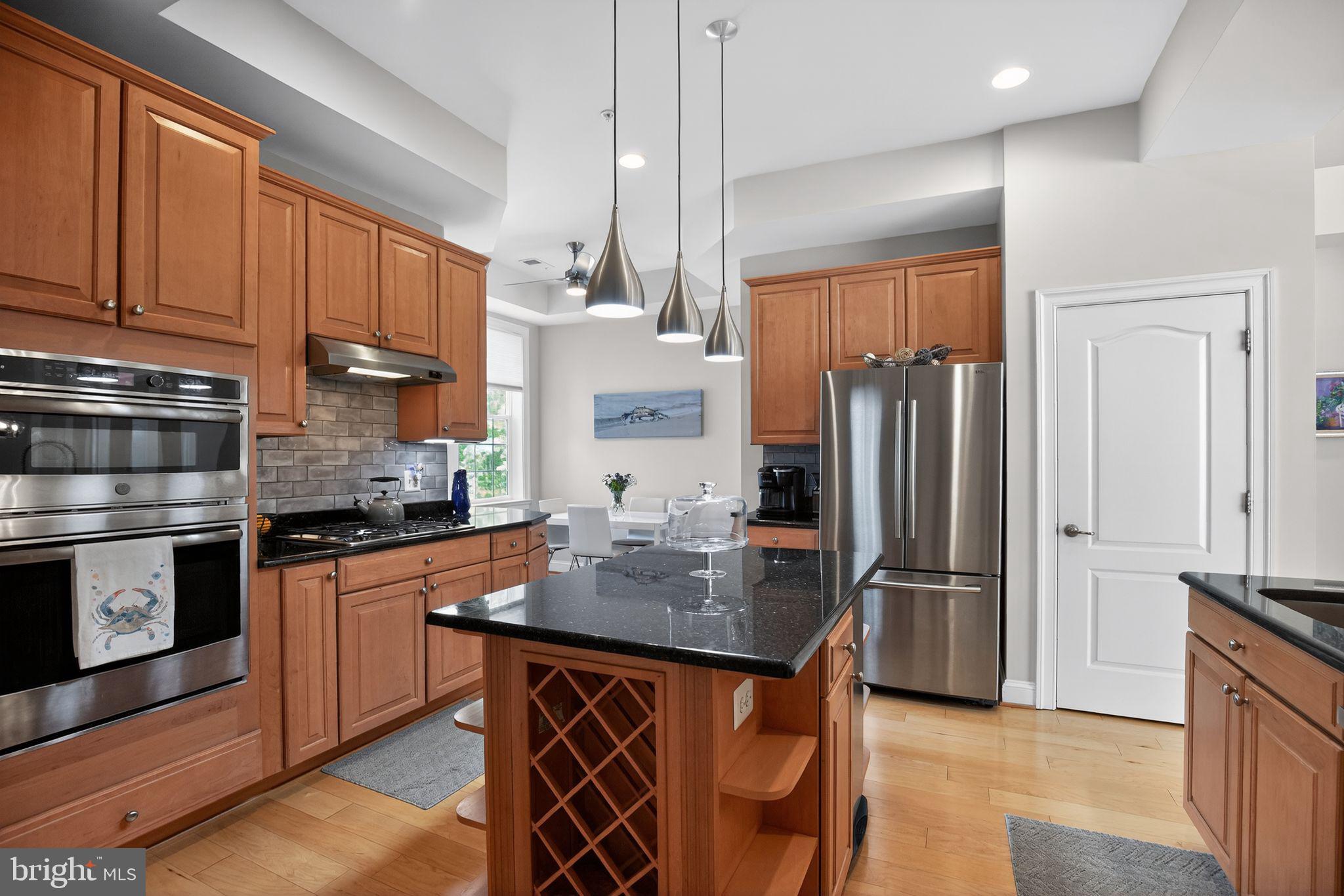 1331 Schooner Loop, Unit 1331 Solomons, MD 20688 - Photo 12 of 53 Kitchen with elegant finishes, extensive cabinetry