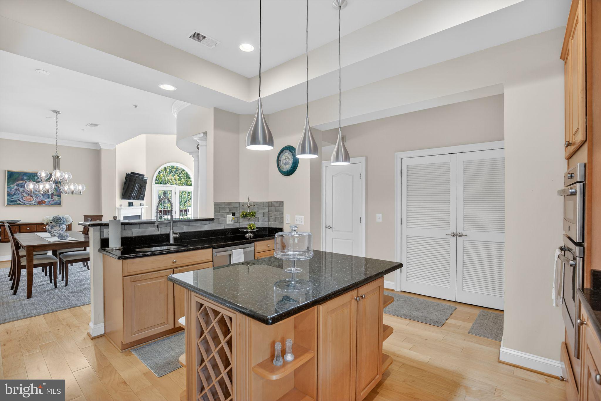 1331 Schooner Loop, Unit 1331 Solomons, MD 20688 - Photo 20 of 53 Kitchen opens to dining area and main living area