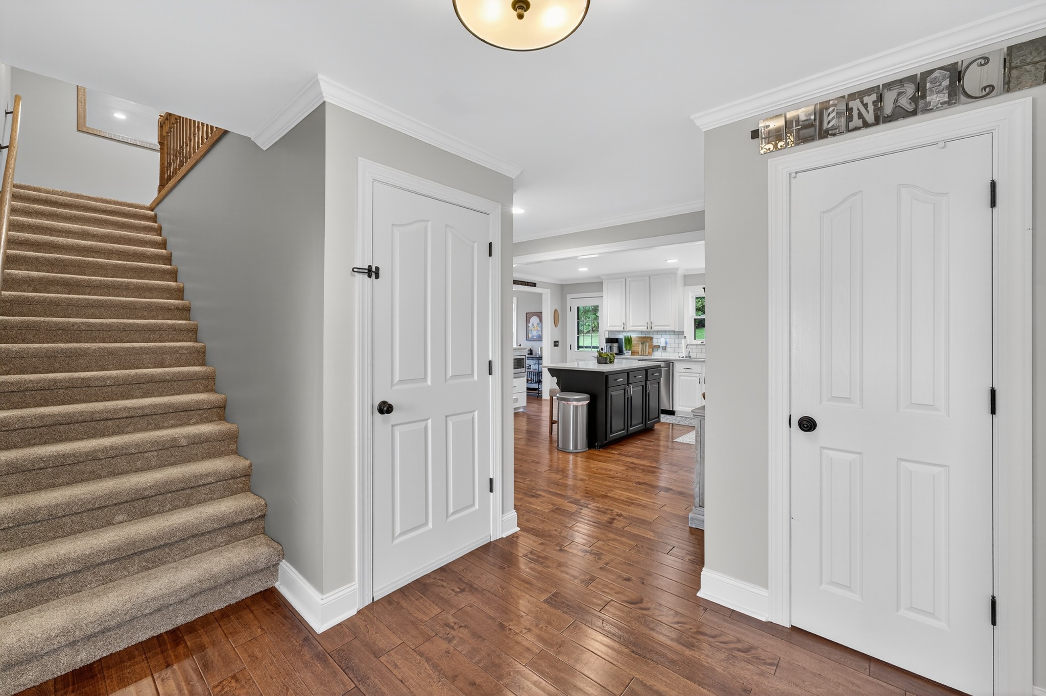 915 Normandy Road Normandy, TN 37360 - Photo 19 of 100 a view of a hallway with wooden floor and entryway