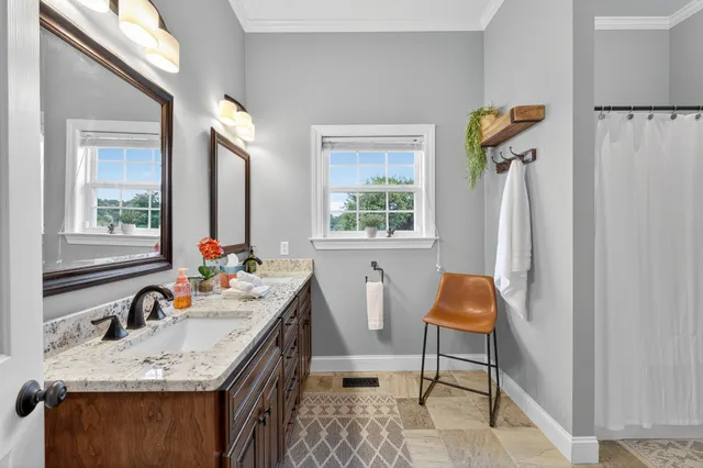 a view of a table and chairs on the roof deck