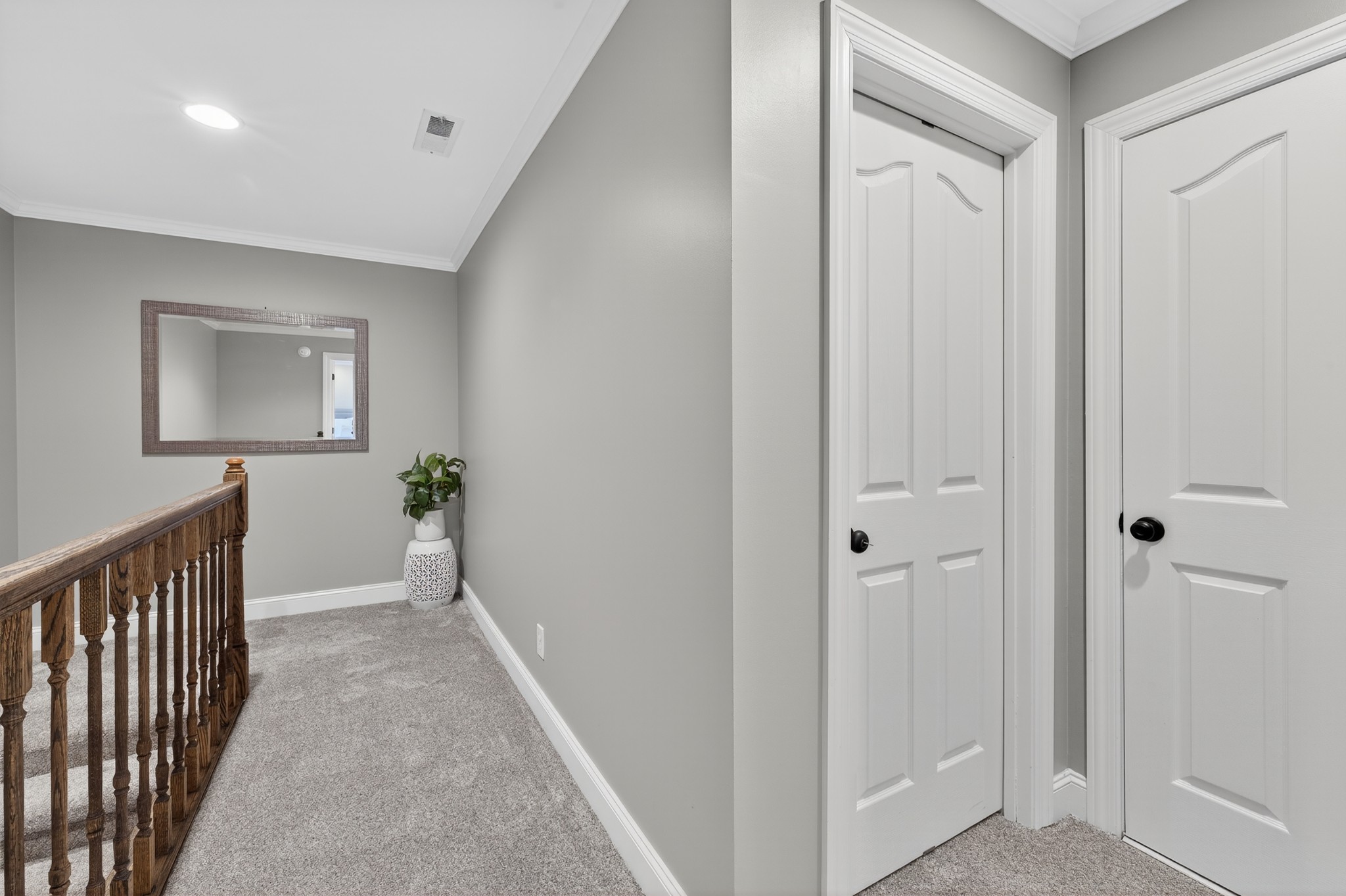 915 Normandy Road Normandy, TN 37360 - Photo 45 of 100 a view of a hallway to a room with wooden floor and windows