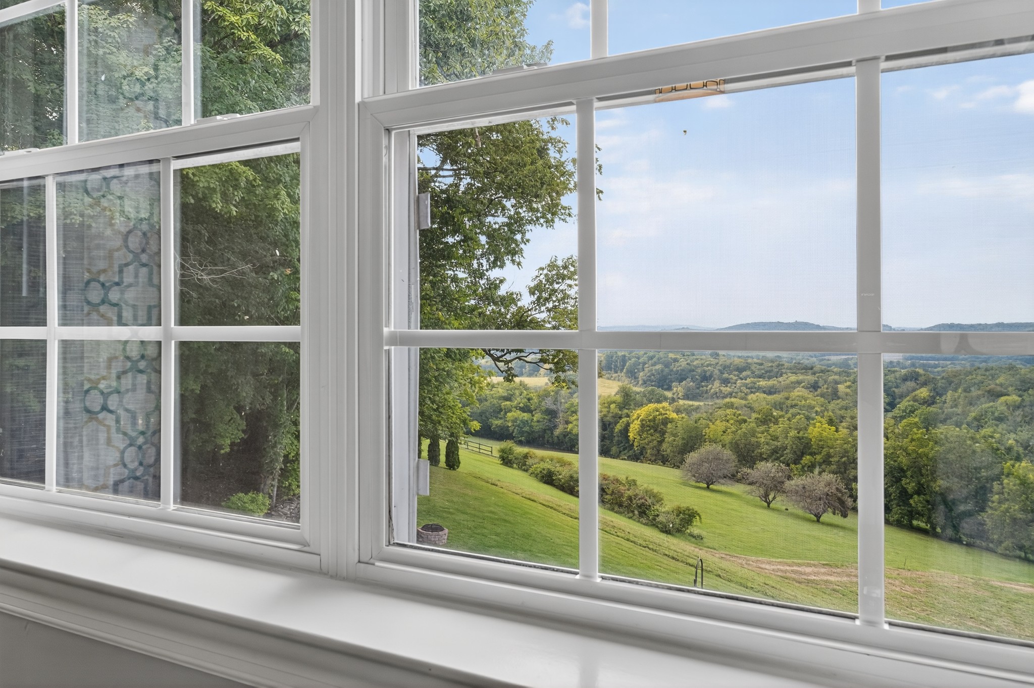 915 Normandy Road Normandy, TN 37360 - Photo 57 of 100 a view of a room that has a large window and a yard