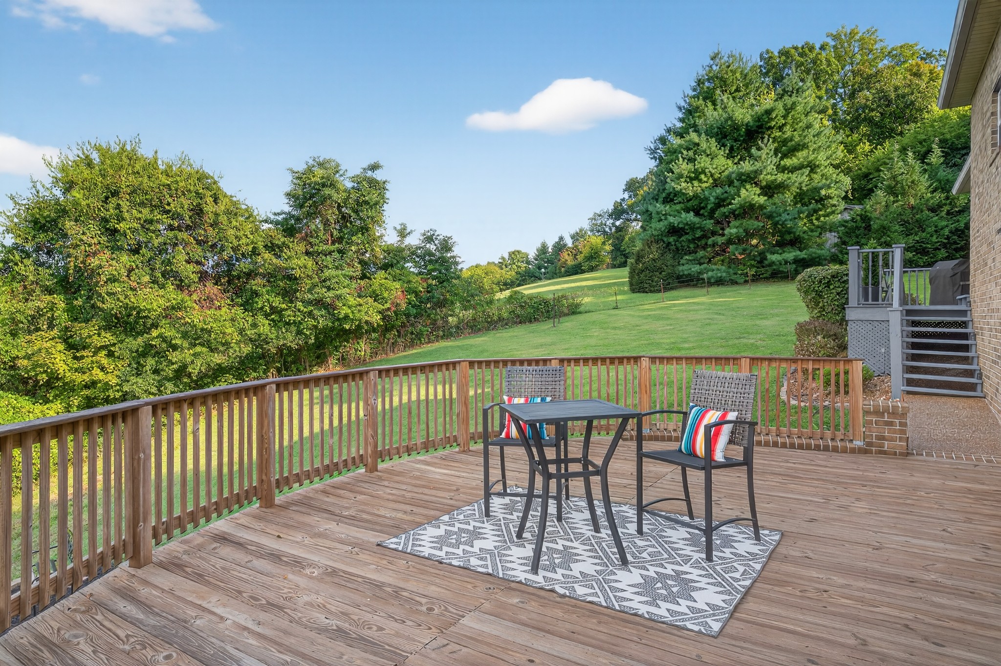 915 Normandy Road Normandy, TN 37360 - Photo 69 of 100 a view of a table and chairs on the roof deck