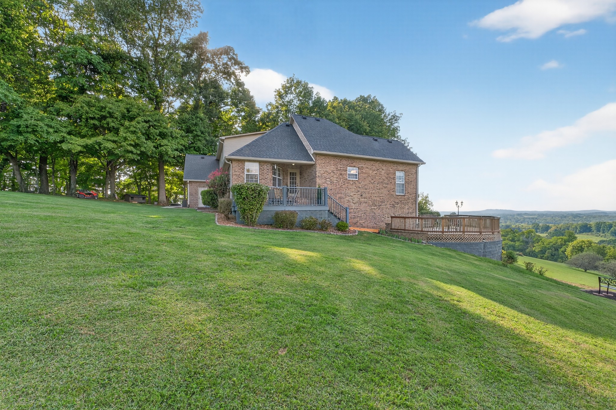 915 Normandy Road Normandy, TN 37360 - Photo 81 of 100 a view of a house with a yard and a garden