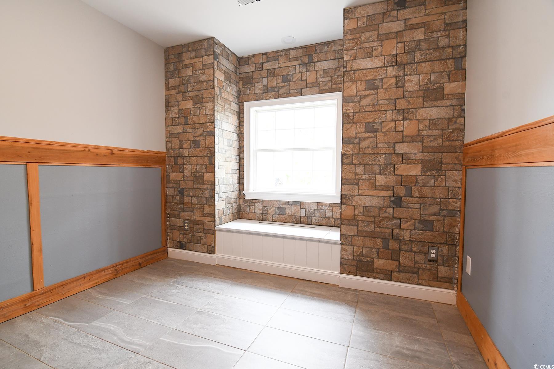 971 Folly Road Myrtle Beach, SC 29588 - Photo 7 of 25 View of tiled spare room