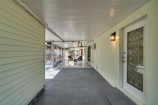 a view of a porch with furniture