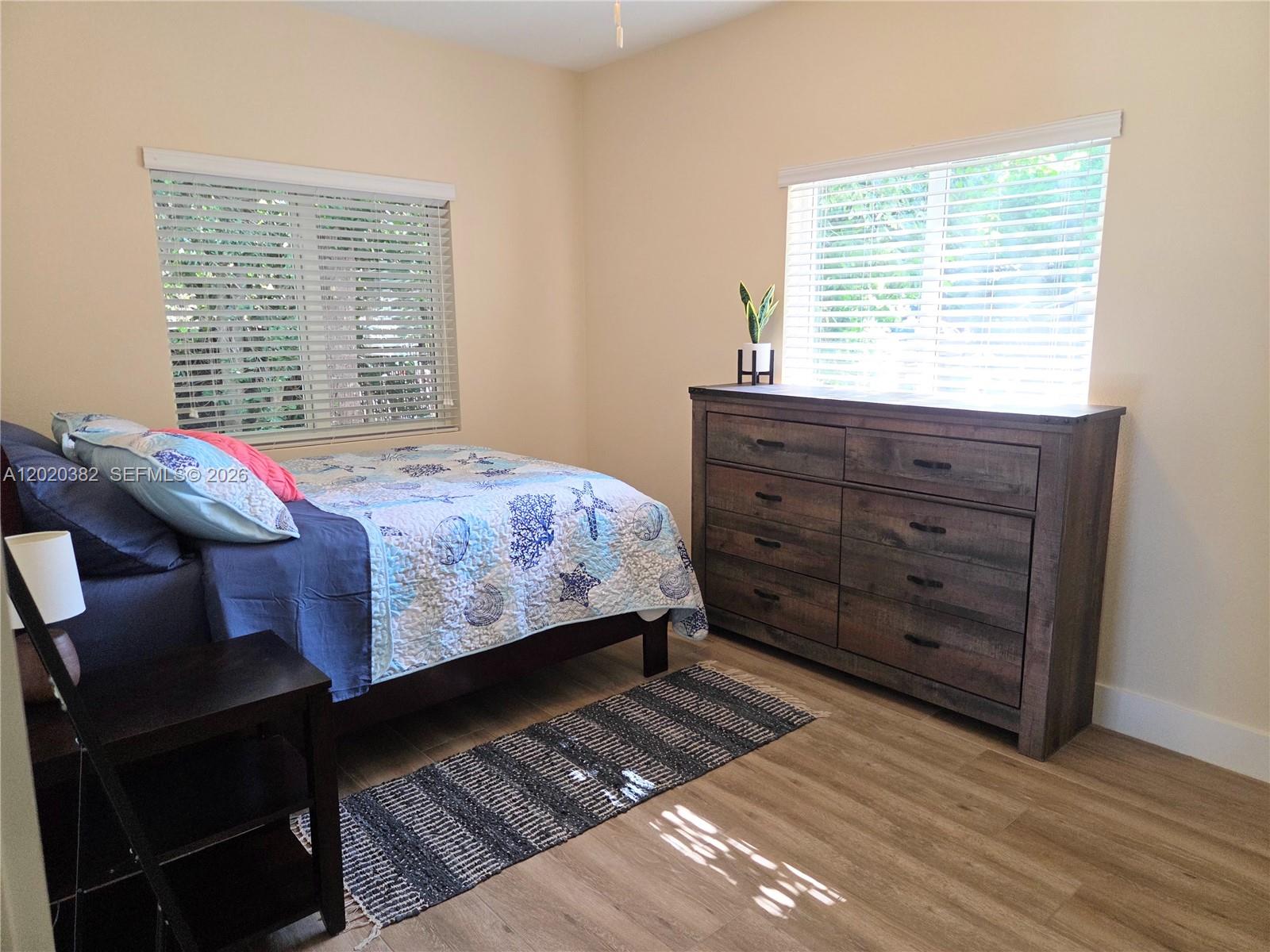 11 Pompano Avenue, Unit 11 Key Largo, FL 33037 - Photo 11 of 15 a bedroom with a bed and a window