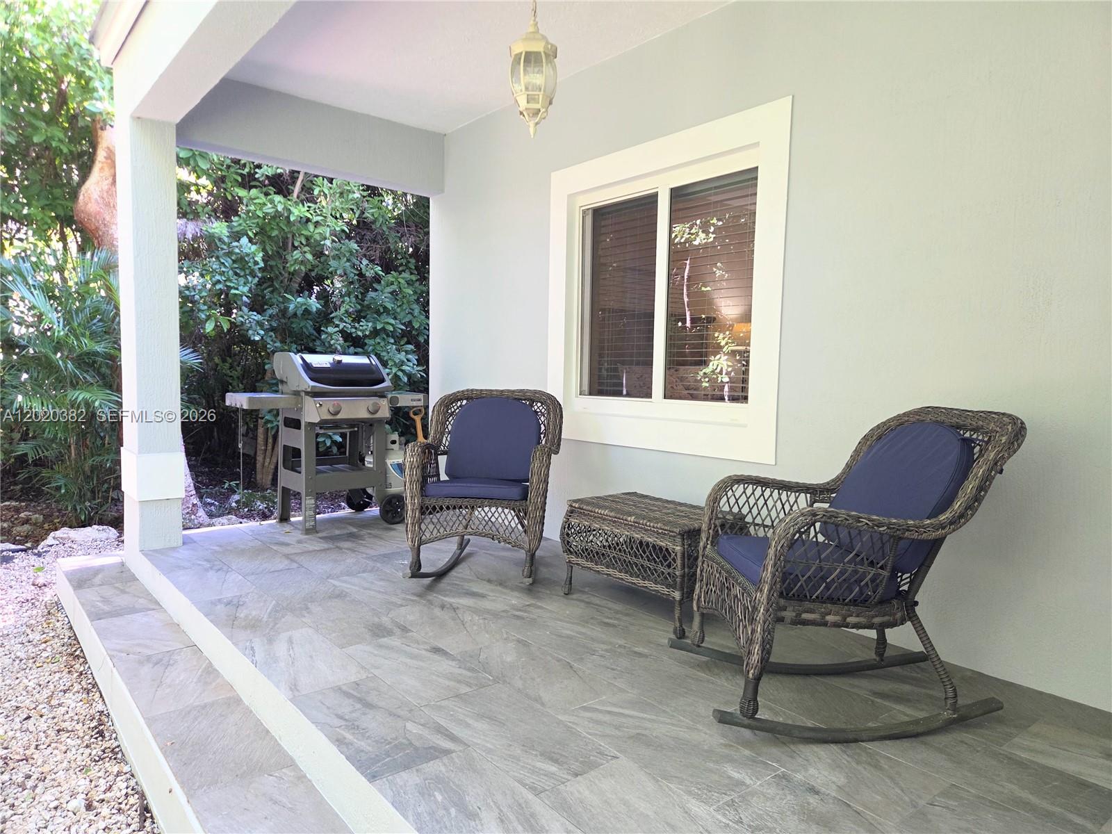 11 Pompano Avenue, Unit 11 Key Largo, FL 33037 - Photo 14 of 15 a view of a workspace with furniture and a window