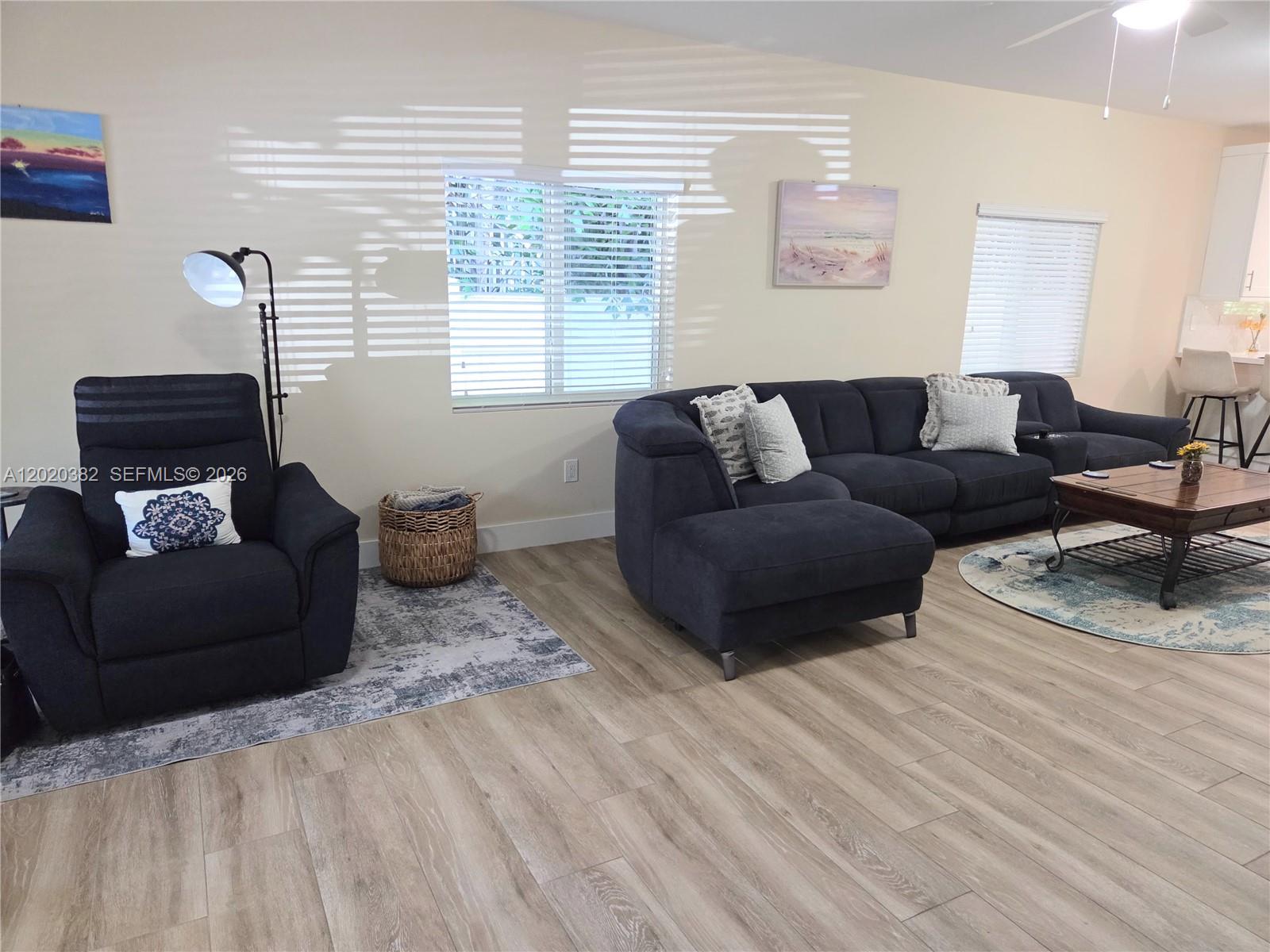 11 Pompano Avenue, Unit 11 Key Largo, FL 33037 - Photo 3 of 15 a living room with furniture window and a wooden floor