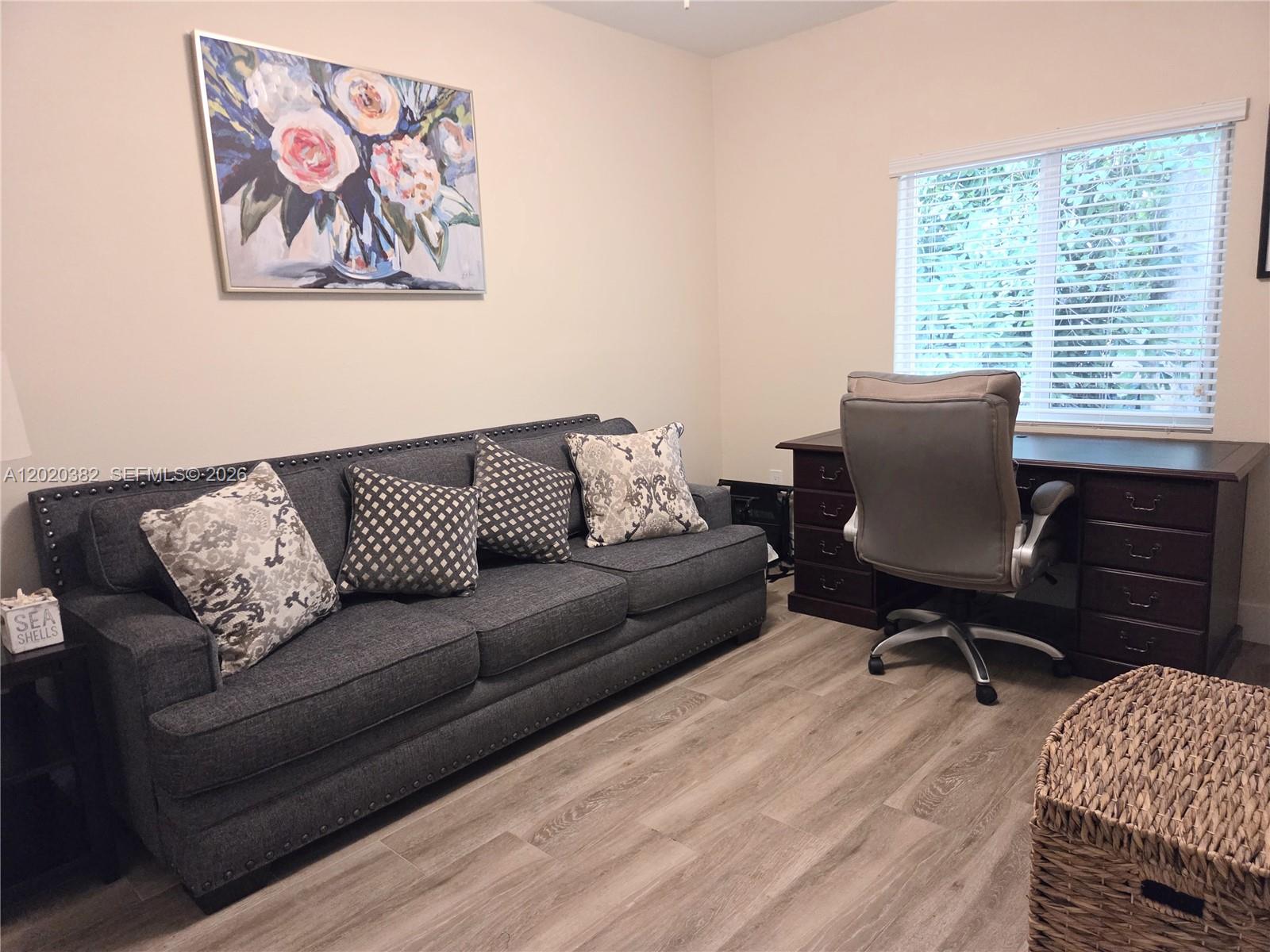 11 Pompano Avenue, Unit 11 Key Largo, FL 33037 - Photo 7 of 15 a living room with furniture and a window