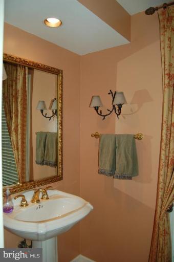 11917 Hunting Ridge Court Potomac, MD 20854 - Photo 13 of 17 Half Bath 1
