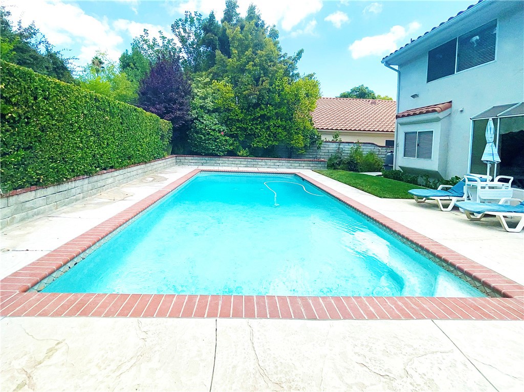 25463 Hardy Place Stevenson Ranch, CA 91381 - Photo 21 of 21 a view of swimming pool with lounge chair
