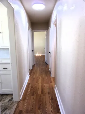 a view of a bathroom from the hallway