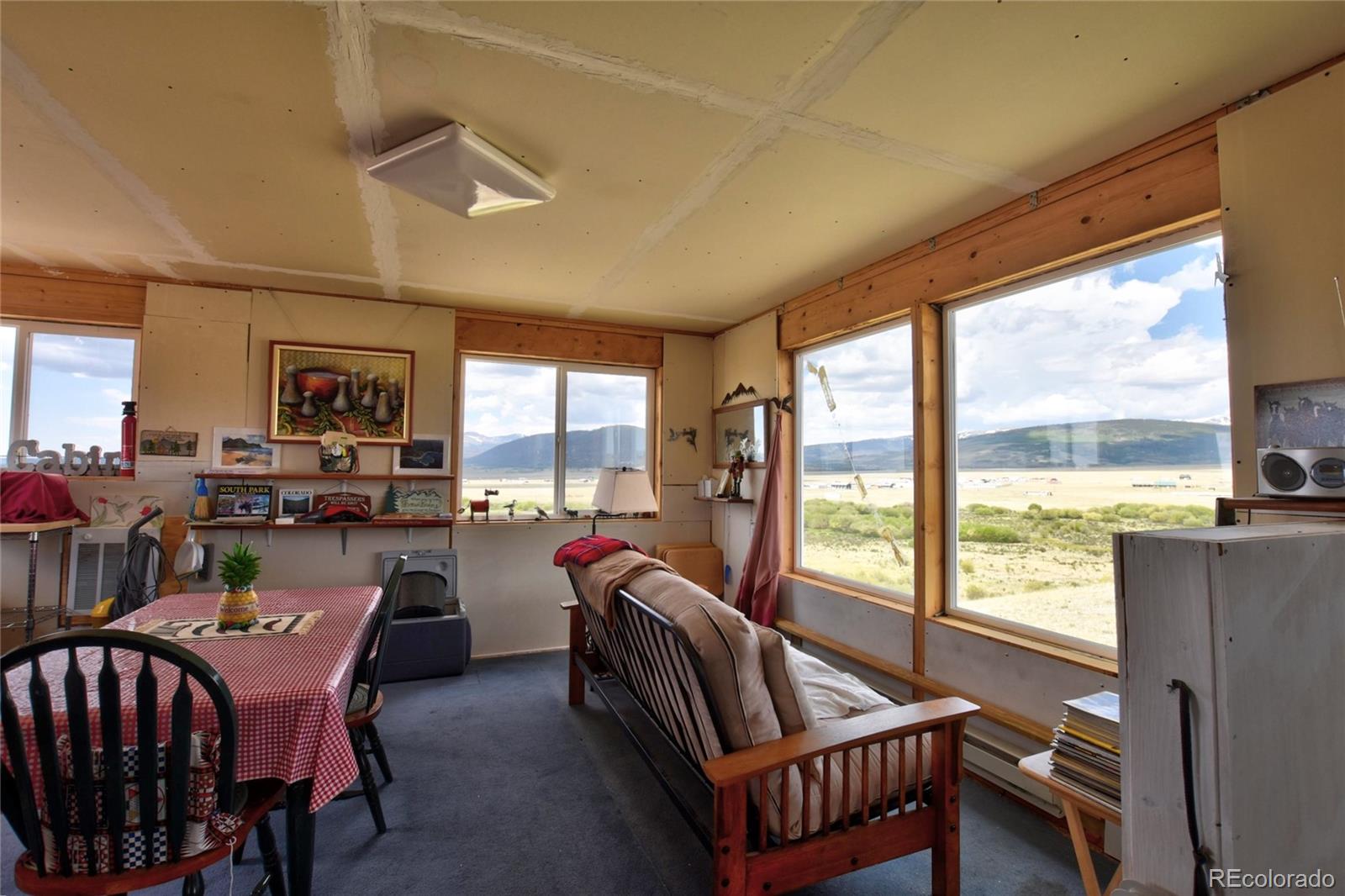 1091 Kokanee Road Fairplay, CO 80440 - Photo 17 of 34 a room with furniture pool table and windows