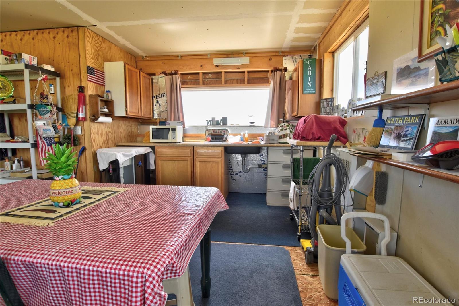 1091 Kokanee Road Fairplay, CO 80440 - Photo 5 of 34 a room with furniture a flat screen tv and a table