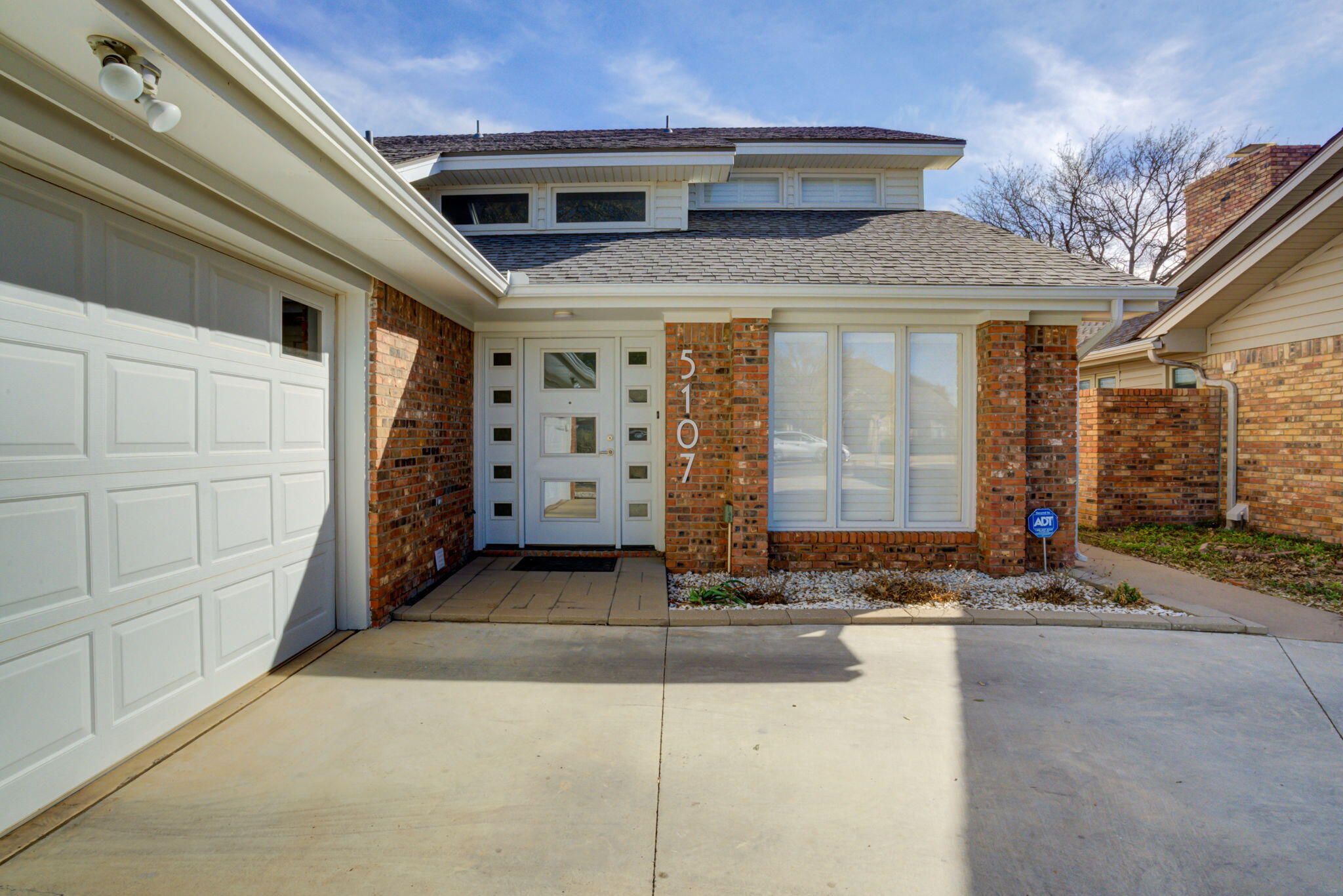 5107 1st Place Lubbock, TX 79416 - Photo 3 of 67 a view of a entryway door of the house