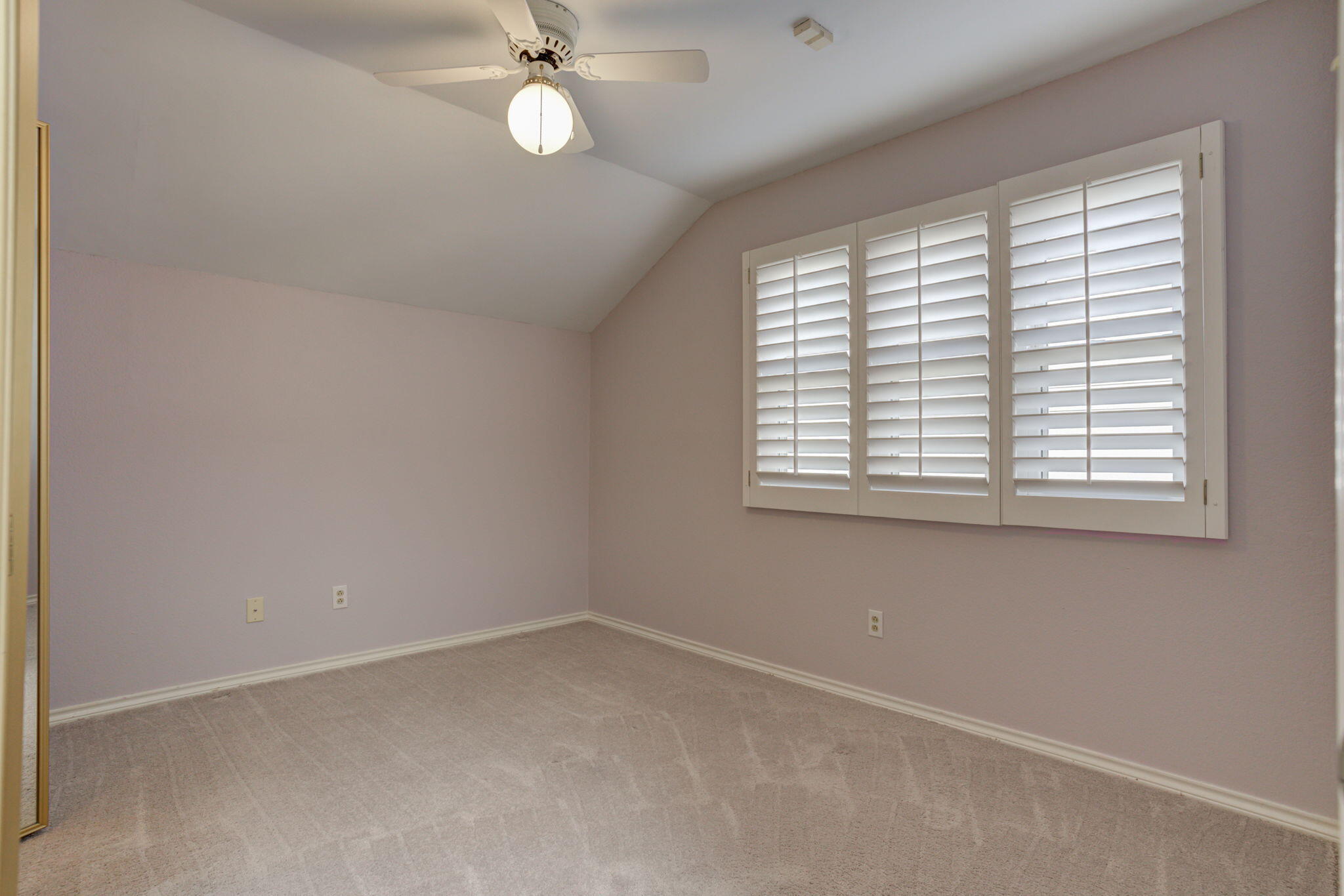 5107 1st Place Lubbock, TX 79416 - Photo 49 of 67 an empty room with a window