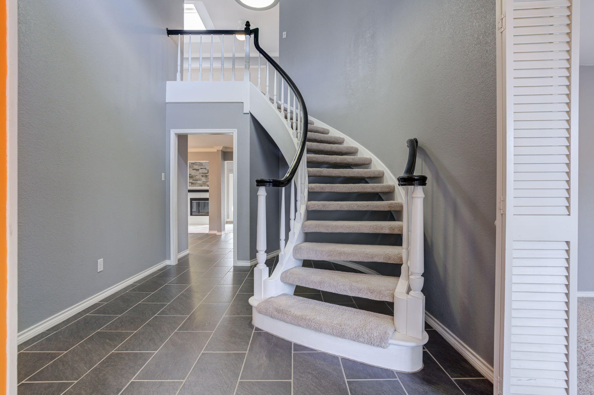 5107 1st Place Lubbock, TX 79416 - Photo 5 of 67 a view of entryway and hall with wooden floor