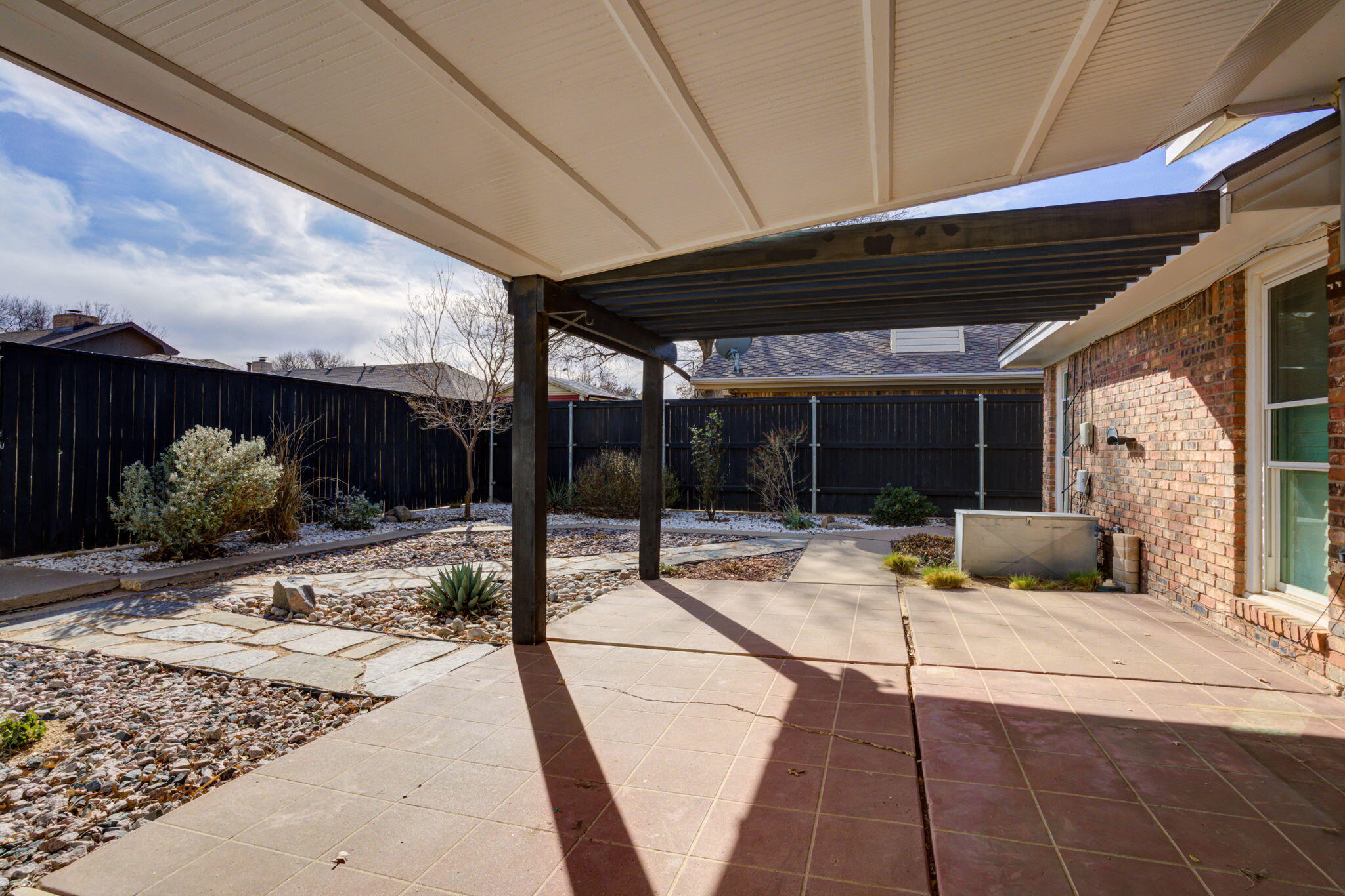 5107 1st Place Lubbock, TX 79416 - Photo 54 of 67 a view of a backyard with sitting area