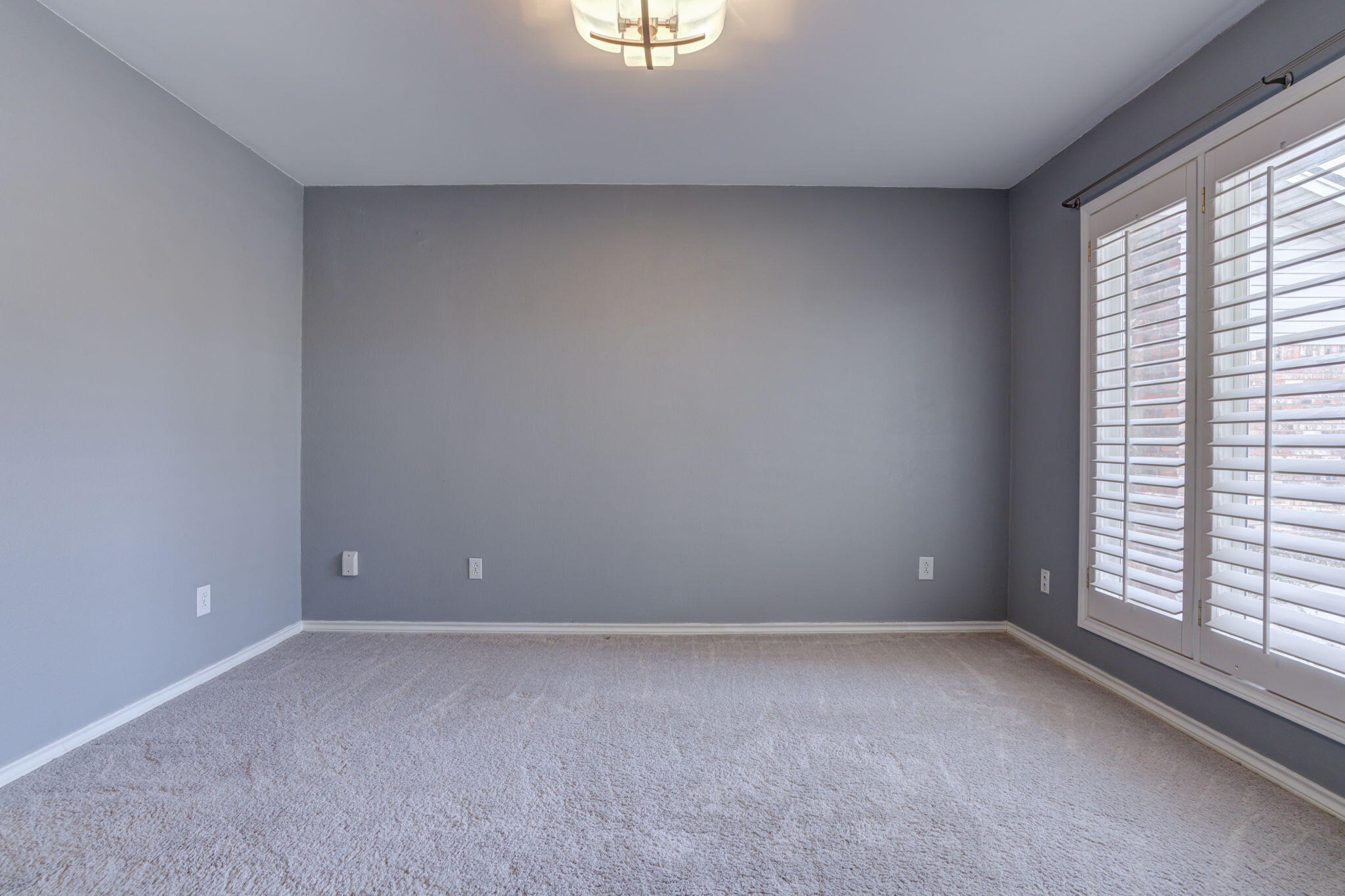 5107 1st Place Lubbock, TX 79416 - Photo 7 of 67 an empty room with a window