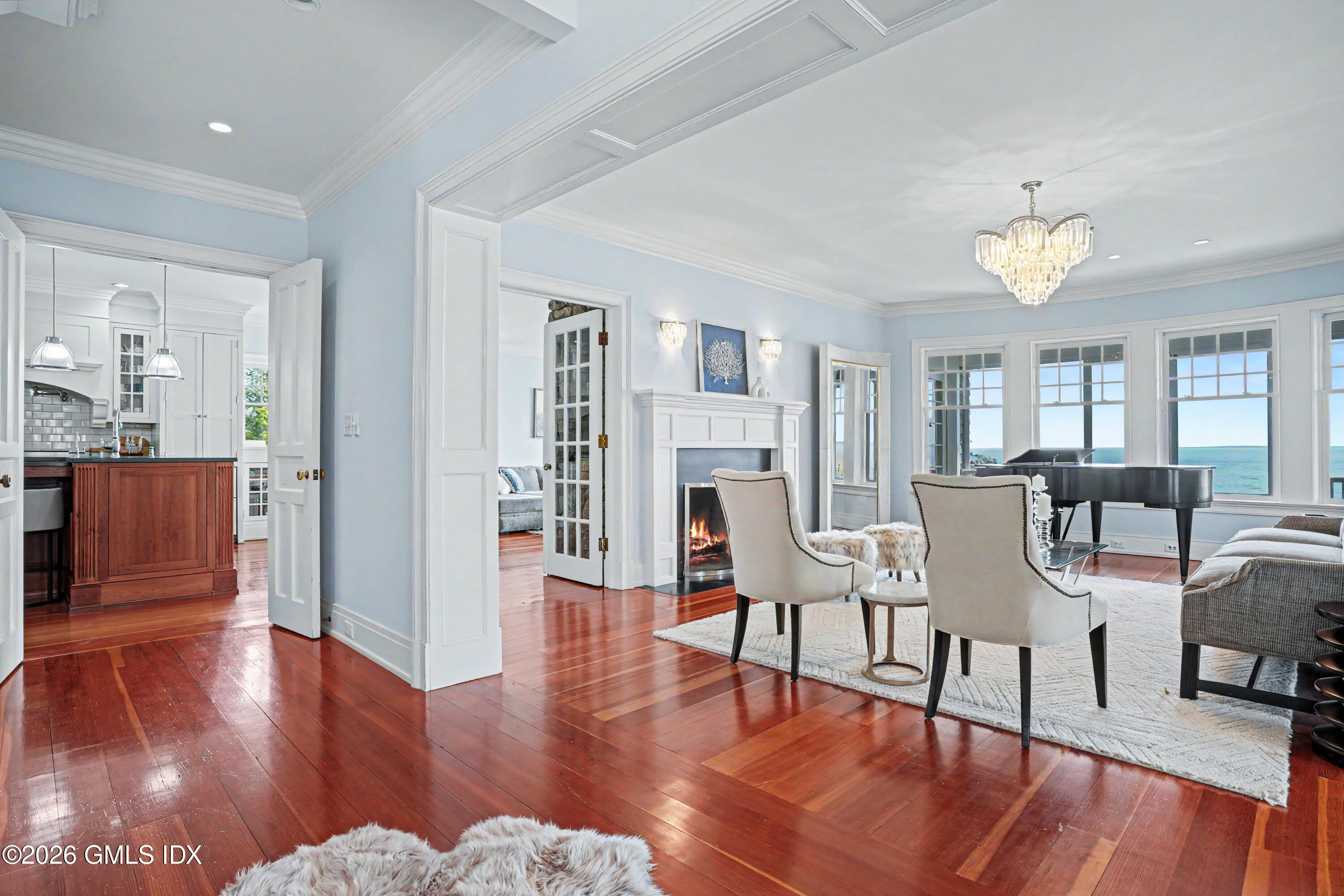 200 Shore Road Old Greenwich, CT 06870 - Photo 2 of 34 a view of a dining room with furniture and wooden floor
