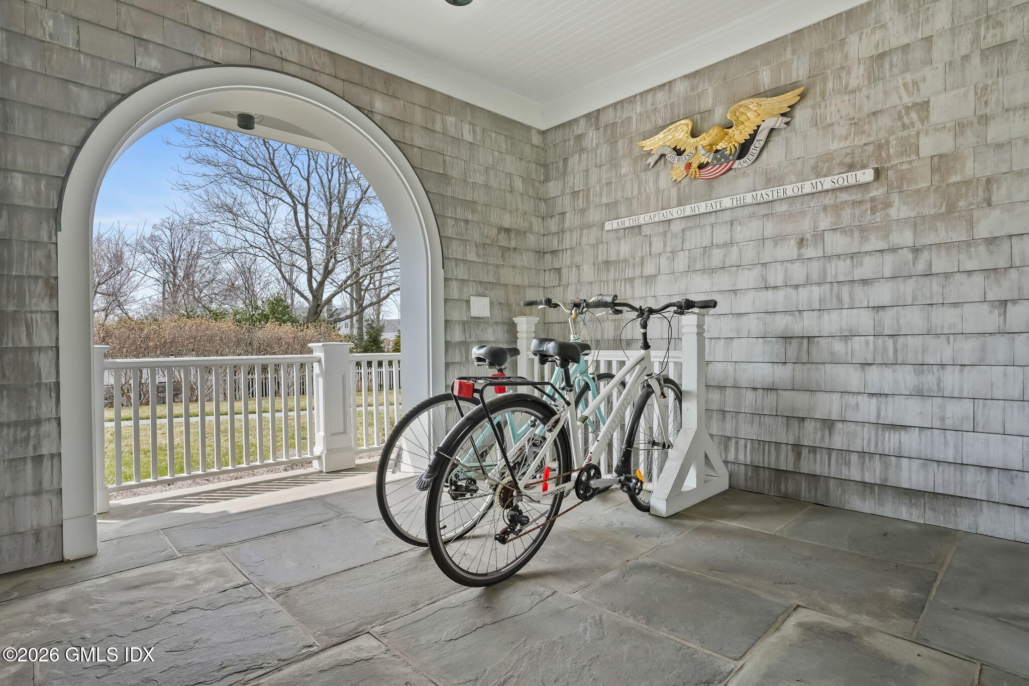 200 Shore Road Old Greenwich, CT 06870 - Photo 23 of 34 a view of front door with wooden fence