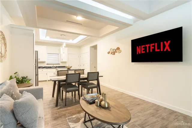 a view of a dining room with furniture window and outside view