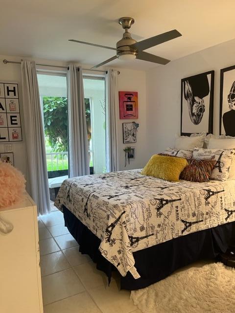 7875 La Mirada Drive Boca Raton, FL 33433 - Photo 18 of 31 a bedroom with a bed dresser and a window