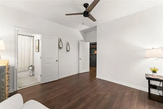 a bathroom with a sink a mirror a toilet and a sink