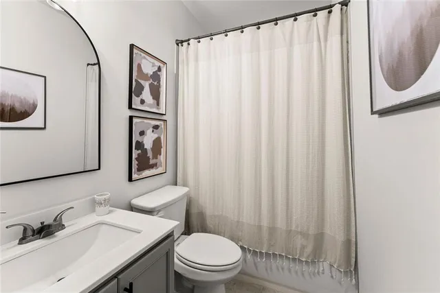 a view of a patio with couches chairs and a table and chairs