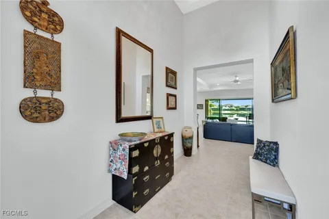 a view of living room filled with furniture and window