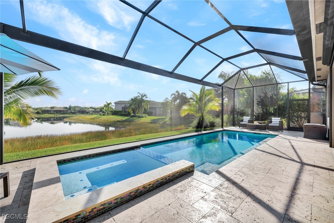 11725 Stonecreek Circle Fort Myers, FL 33913 - Photo 28 of 40 a view of swimming pool with a patio