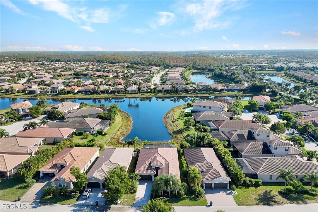 11725 Stonecreek Circle Fort Myers, FL 33913 - Photo 3 of 40 an aerial view of residential houses with outdoor space