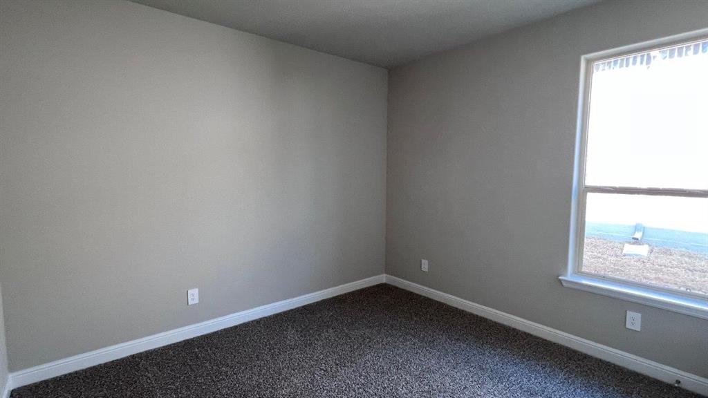 125 Medina Lane Rhome, TX 76078 - Photo 13 of 21 a room that has a window