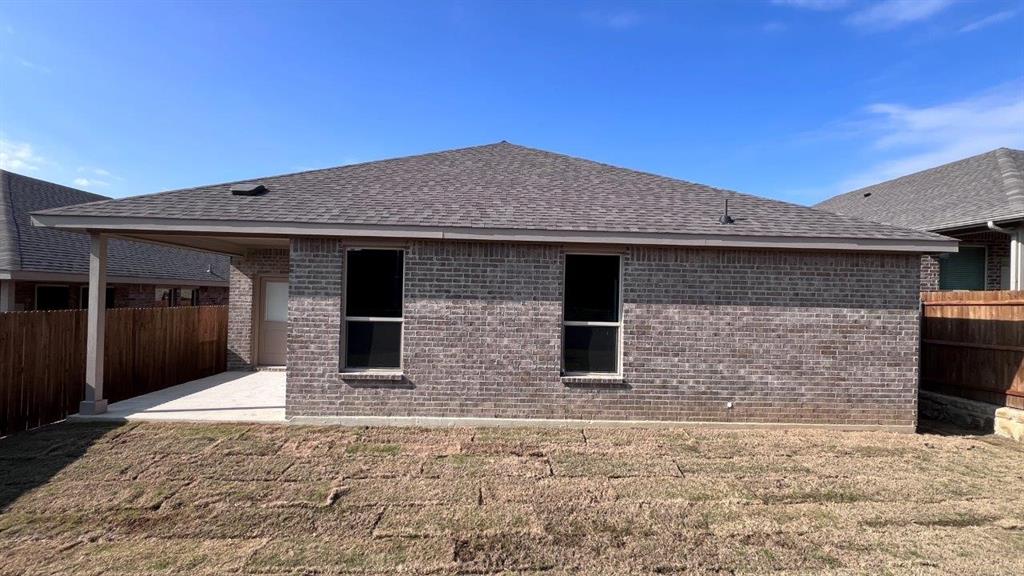 125 Medina Lane Rhome, TX 76078 - Photo 20 of 21 a front view of a house with windows