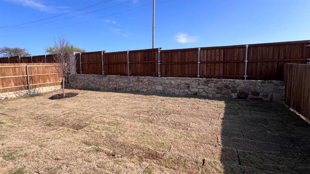 125 Medina Lane Rhome, TX 76078 - Photo 15 of 21 a view of a backyard