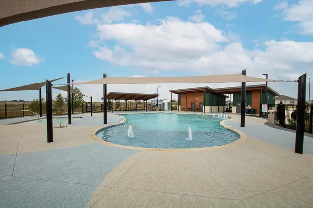 a view of outdoor space with swimming pool