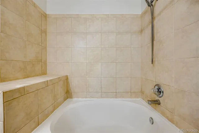 a bathroom with a bathtub